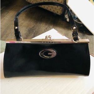 Guess patent leather dress purse lined with outside and inside zippers